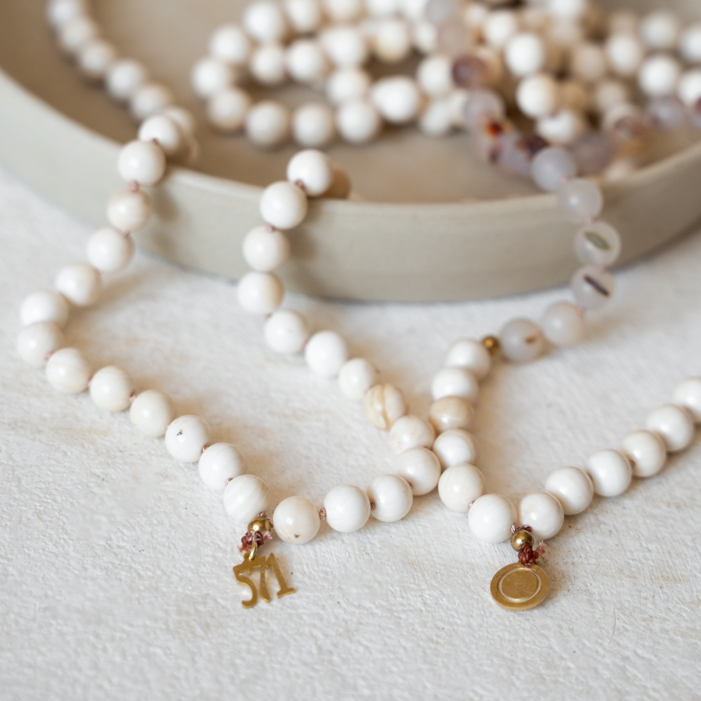 handgeknüpfte Gebetskette_Mala_Muschel_Achat_Heilsteine_Natursteine_Spiritualität_Gebet_Dhikr_nourganics