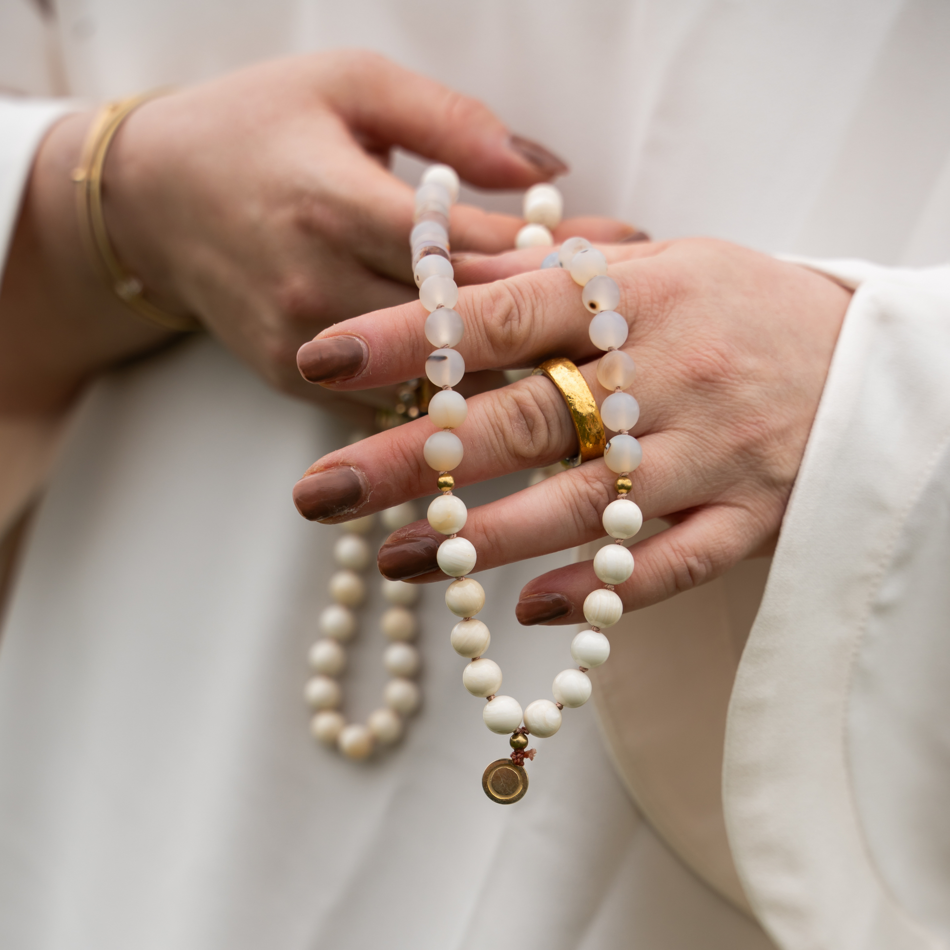 handgeknüpfte Gebetskette_Mala_Tesbih_Muschel_Achat_Heilsteine_Natursteine_Spiritualität_Gebet_Dhikr_nourganics